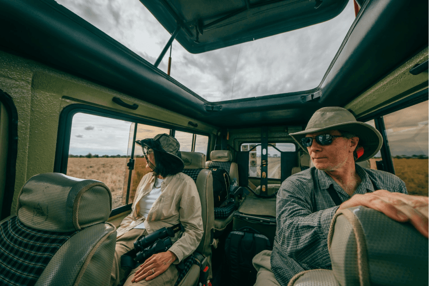 Photo of people in a safari van